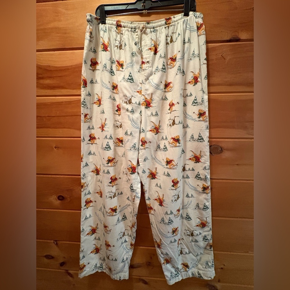 Winnie the Pooh size extra large pajama pants with a cute winter scene.